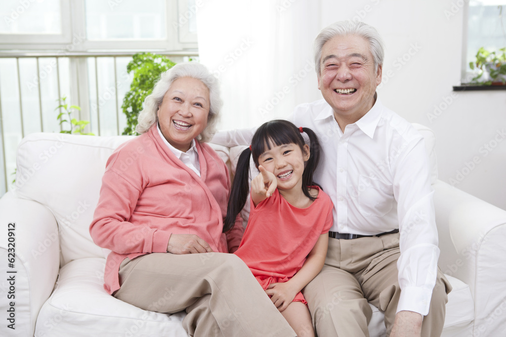 .Senior couple with granddaughter.