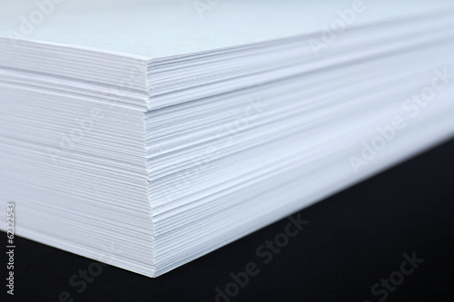 White paper on black background close-up