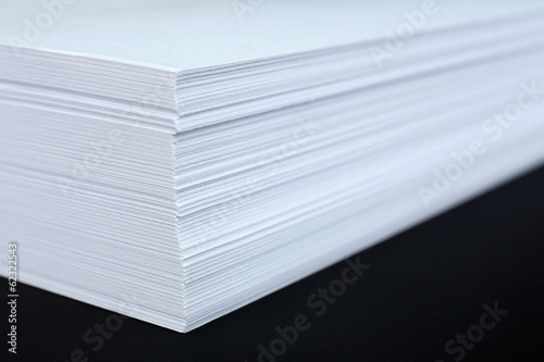 White paper on black background close-up © Africa Studio