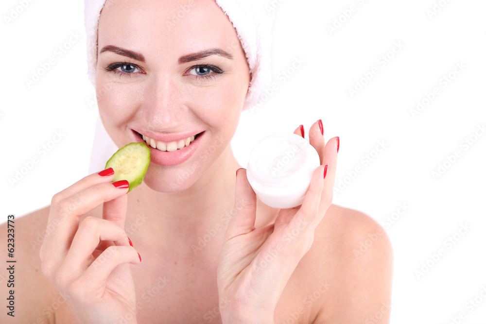Beautiful young woman holding fresh cucumber slices and bowl Beautiful young woman holding fresh cucumber slices and bowl