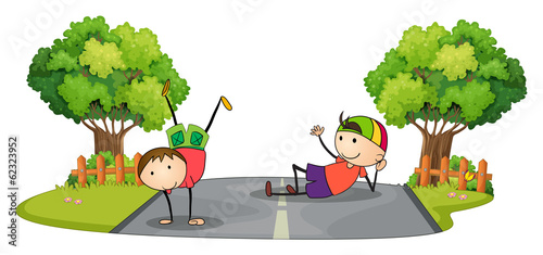 Two kids playing in the middle of the road