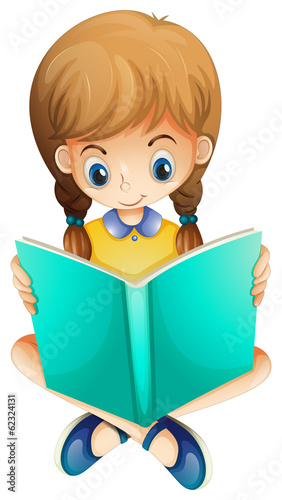 A young girl reading a book seriously