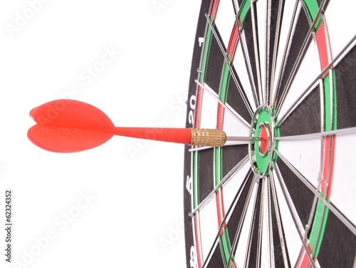 Target aim glossy colored mark with darts in the center