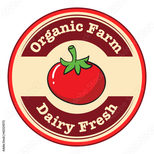 A tomato with a dairy fresh and organic farm label