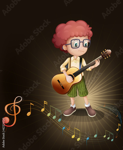 A talented boy with a guitar