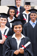 college students in graduation gown
