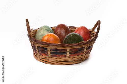 Basket of coloured eggs