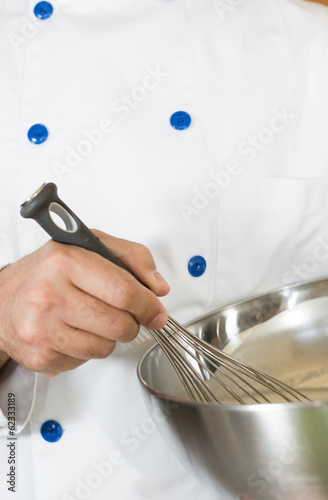 Fotografie Cook whisking
