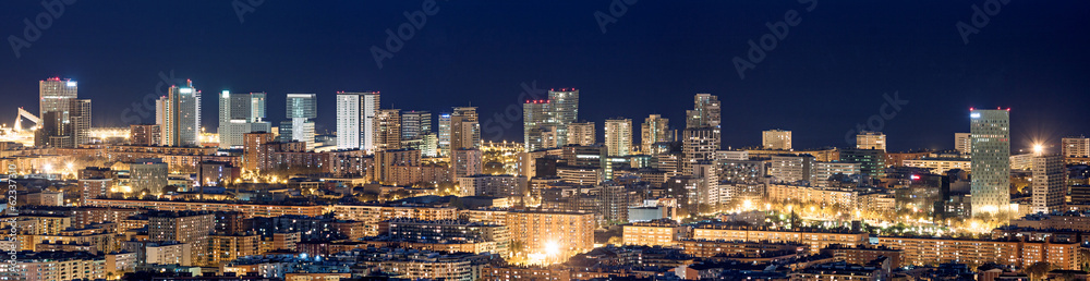 Fototapeta premium Aerial view of financial district in Barcelona at night