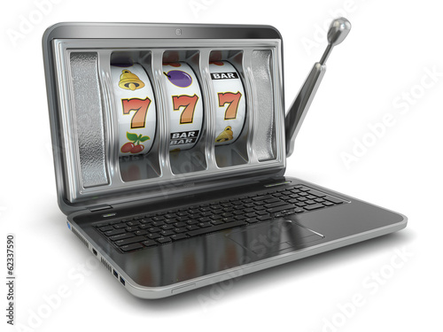 Online gambling concept. Laptop slot machine photo