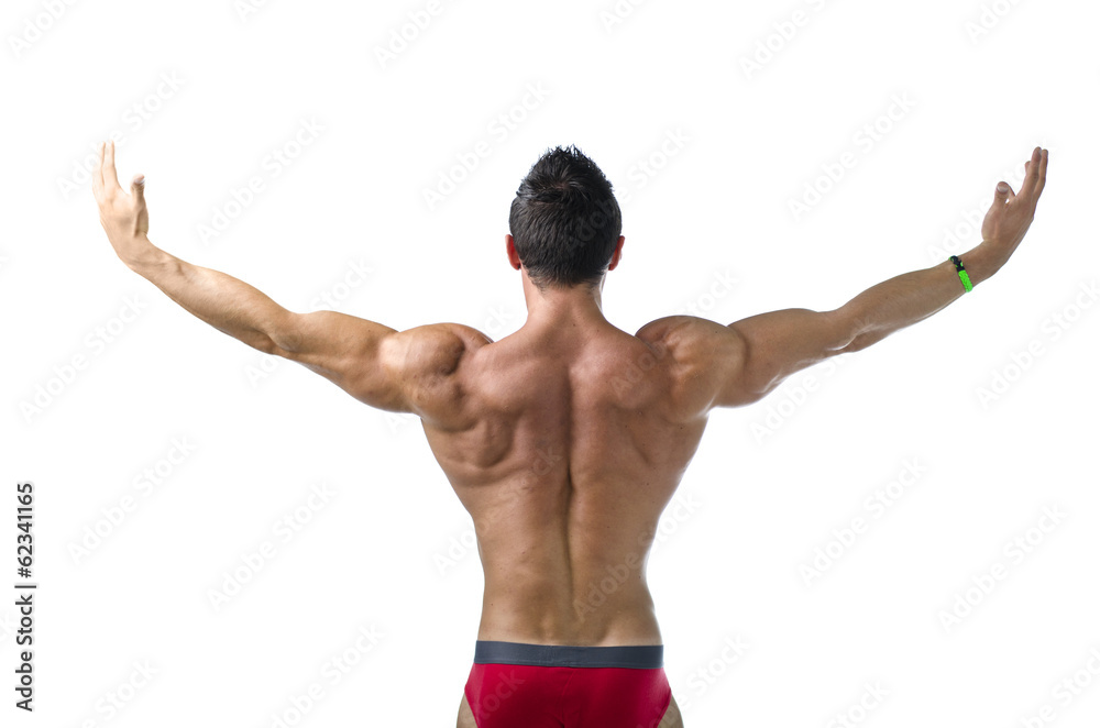Back of young bodybuilder with arms spread open Back of young bodybuilder with arms spread open