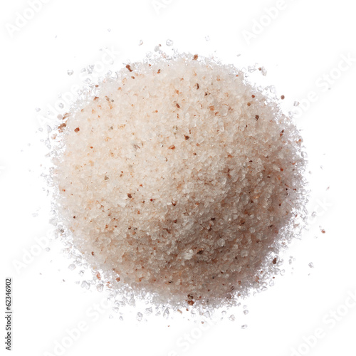 Himalayan pink salt pile isolated on white top view