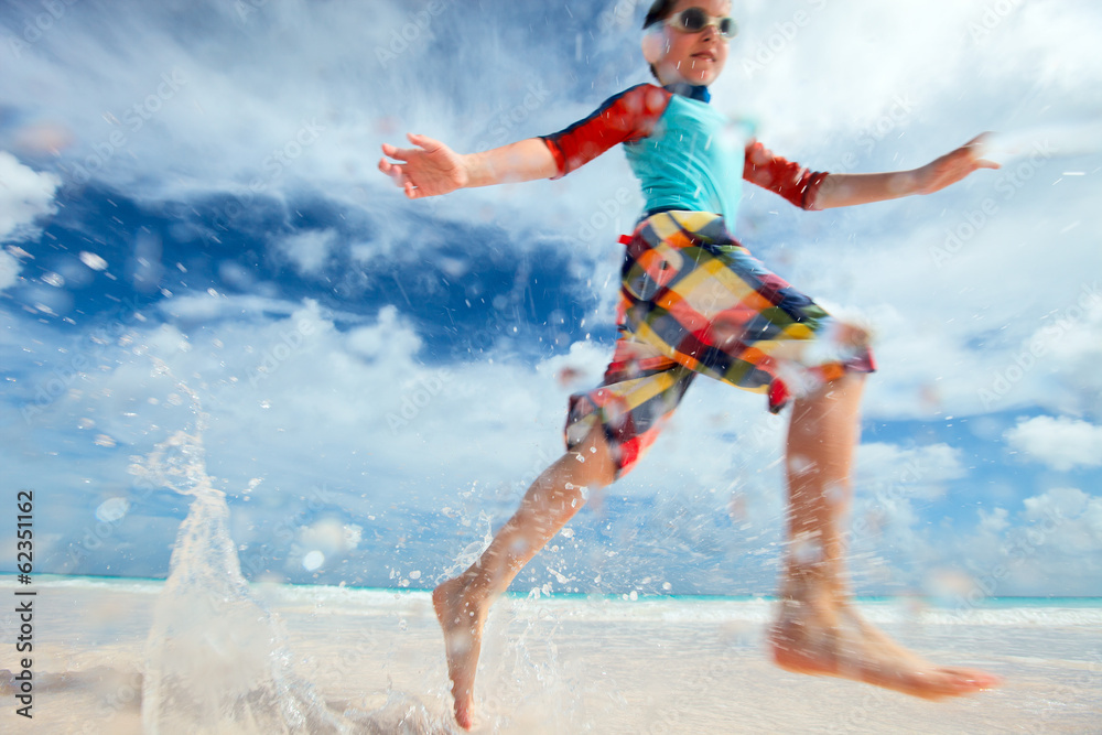 Motion blurred boy running fast Motion blurred boy running fast