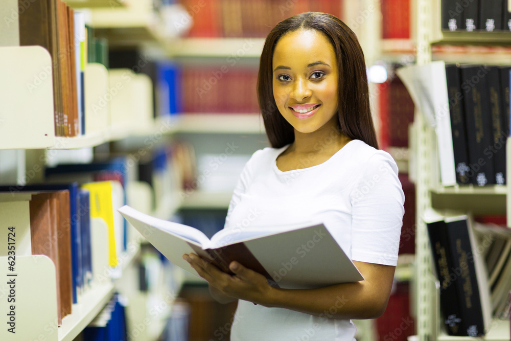 african american college girl reading in library african american college girl reading in library