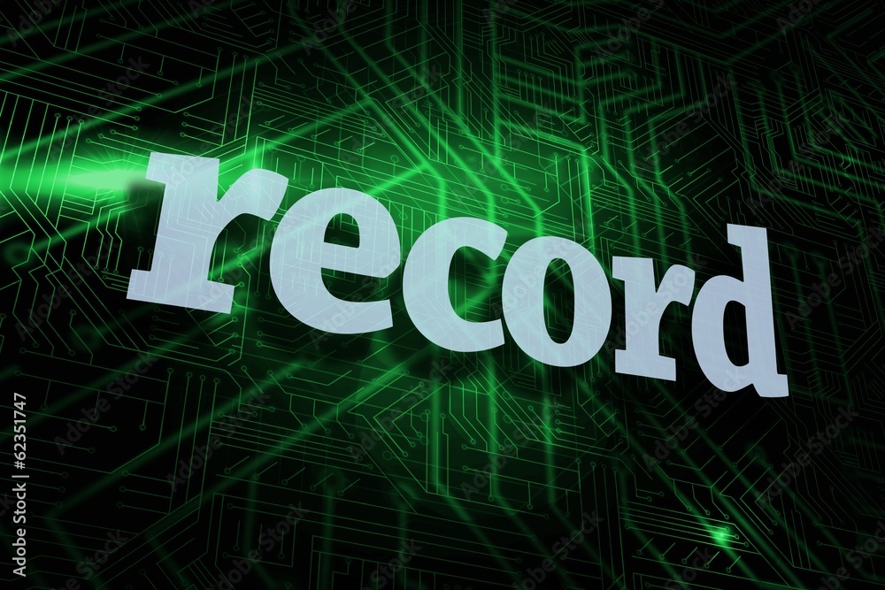 Record against green and black circuit board Record against green and black circuit board