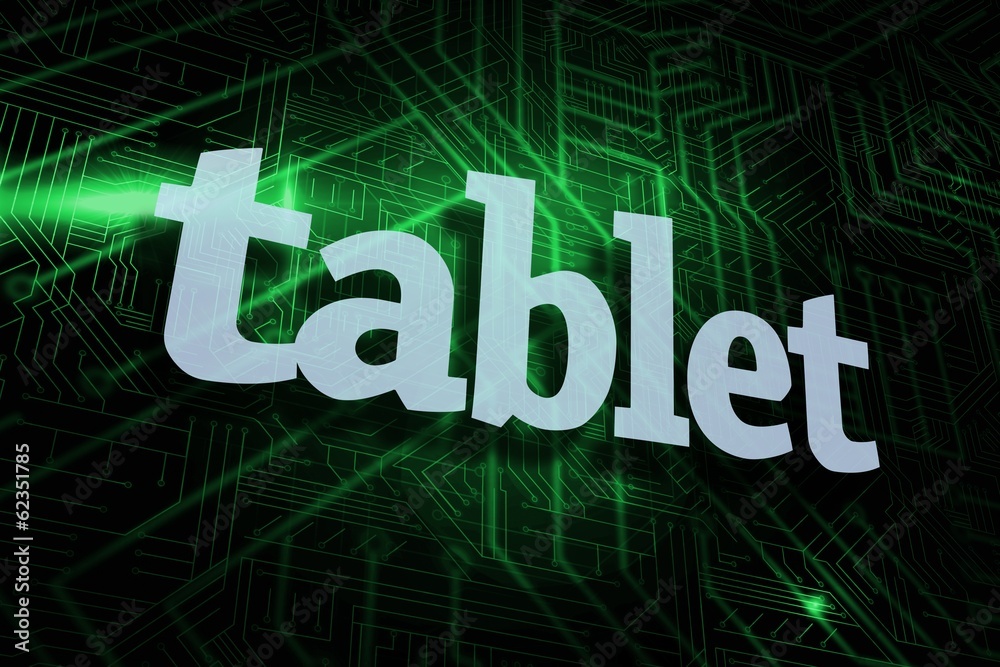 Tablet against green and black circuit board Tablet against green and black circuit board