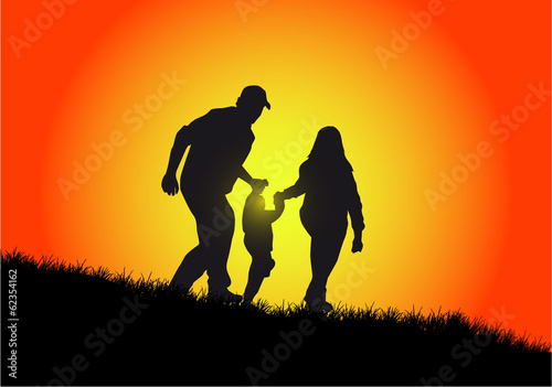 happy family and a beautiful sunset