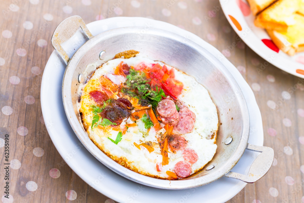 asian style fried egg in pan dish asian style fried egg in pan dish