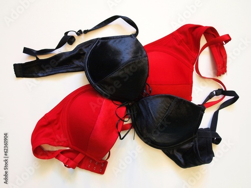 Obraz na płótnie Female red and black bra isolated on white background w salonie