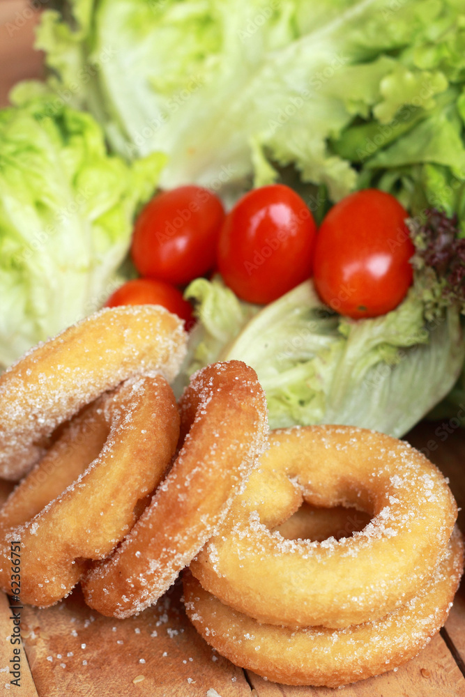 donut and sugar - fresh vegetable salad. donut and sugar - fresh vegetable salad.