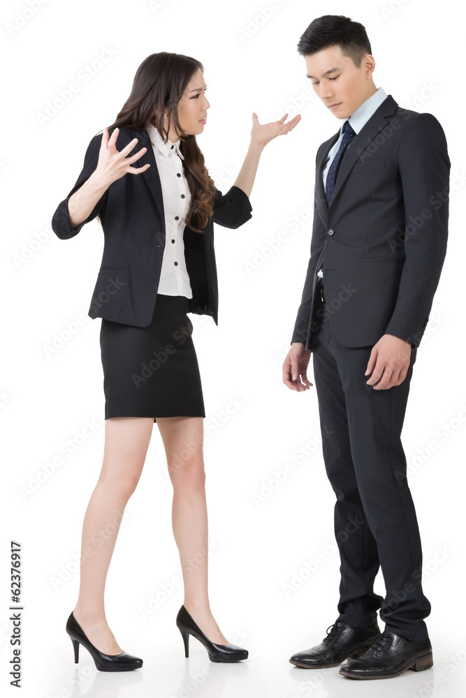 Angry business woman yelling to a man