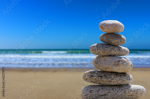zen balance stone on the beach 4