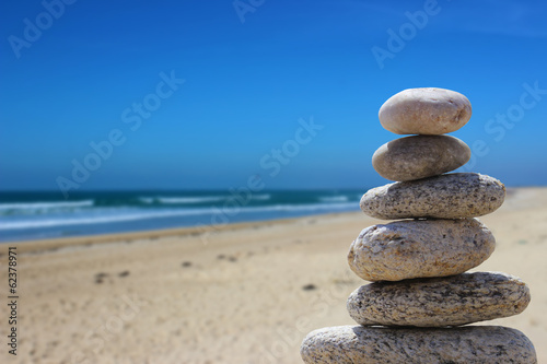zen balance stone on the beach 5