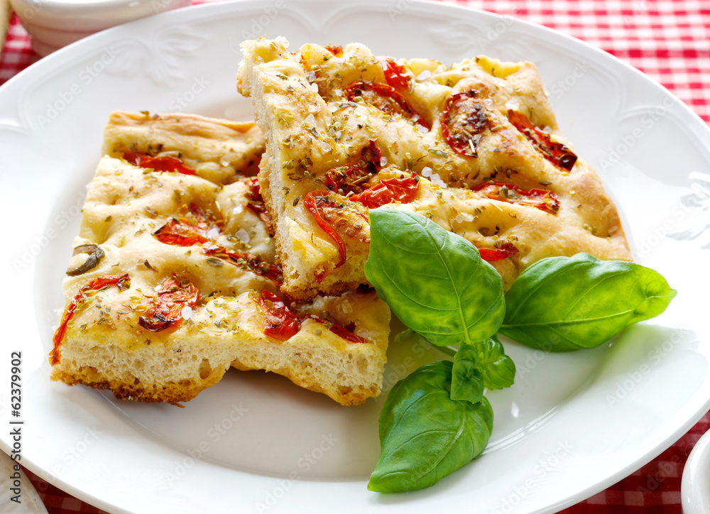 Focaccia with tomatoes and oregano Focaccia with tomatoes and oregano