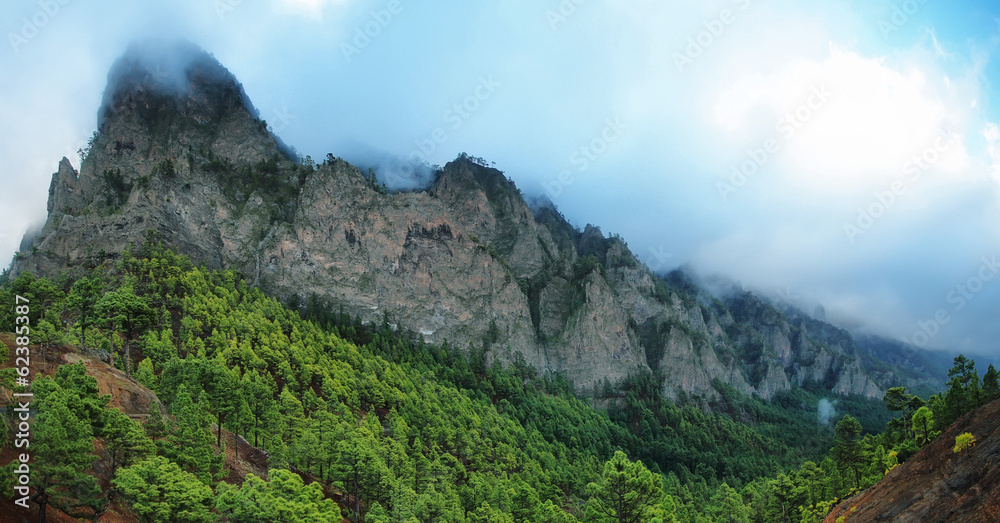 Tumbling clouds over a mountain ridge