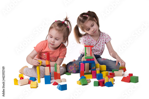 Wallpaper Mural two girls playing with colorful wooden designer sitting Torontodigital.ca