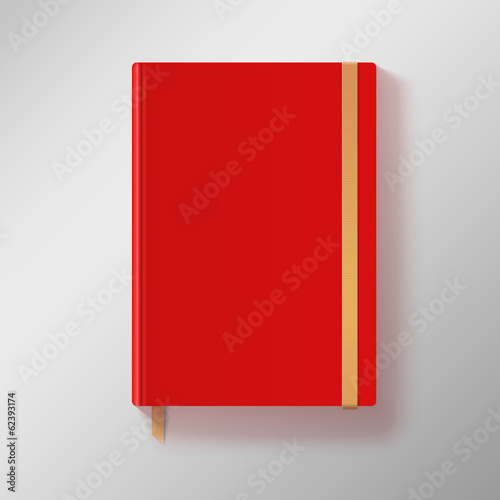 Red copybook with elastic band and gold bookmark.
