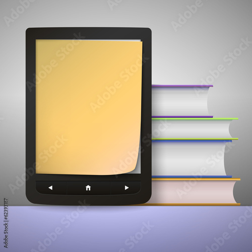 Stack of colorful books with electronic book reader.