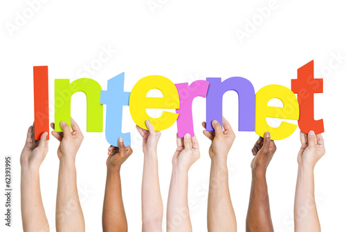 Multi-Ethnic Group Of People Holding The Word Internet