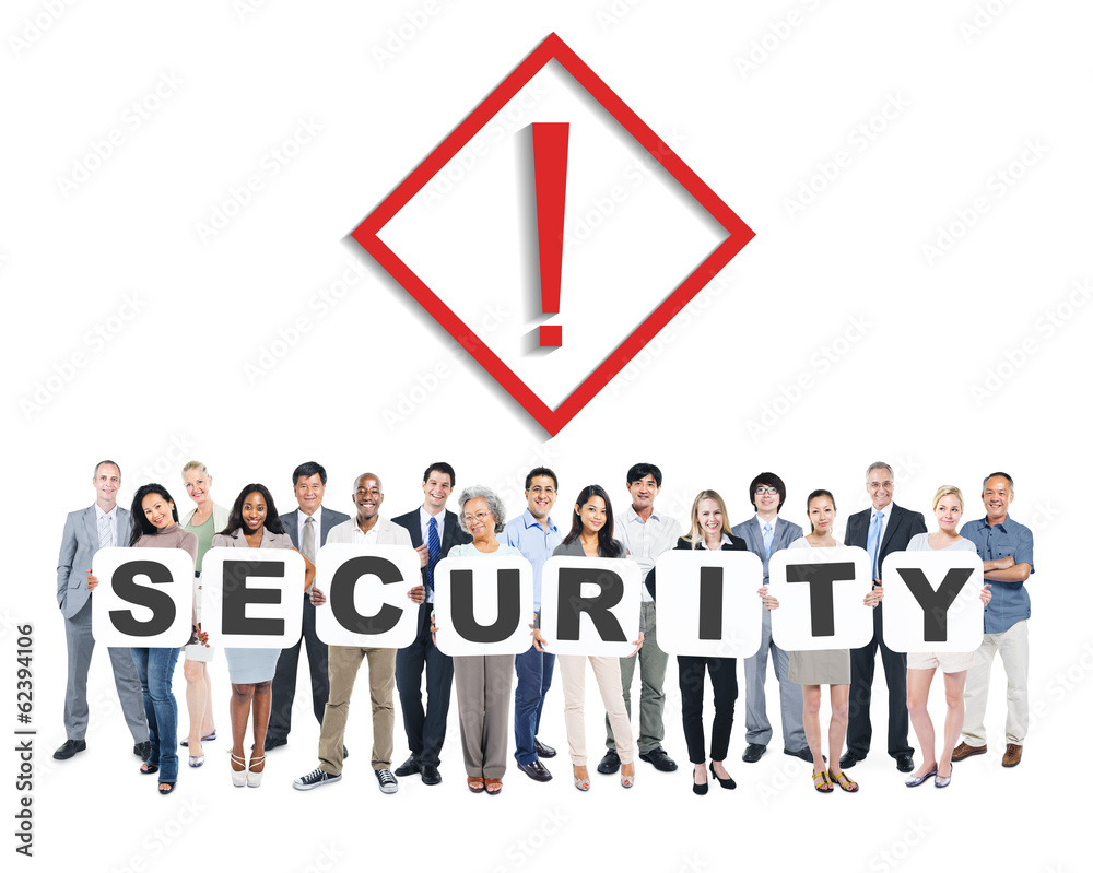 Multi-Ethnic Group Of People Holding The Word Security Multi-Ethnic Group Of People Holding The Word Security