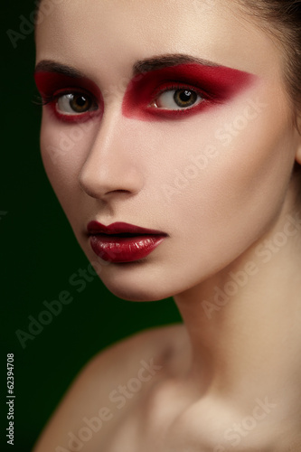 Beautiful portrait of a girl with bright makeup