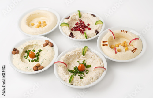 Arabic traditional Hummus Plates with different toppings