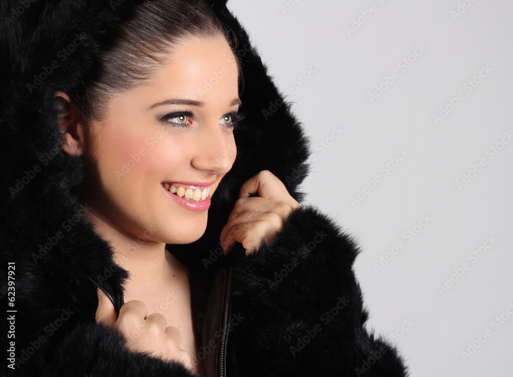 Woman with black coat of skin(leather)