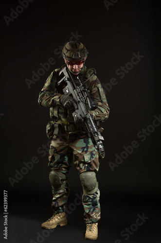 NATO soldier in full gear. © Oleg Shelomentsev