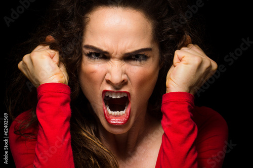 Fotografia Very angry woman clenching fists