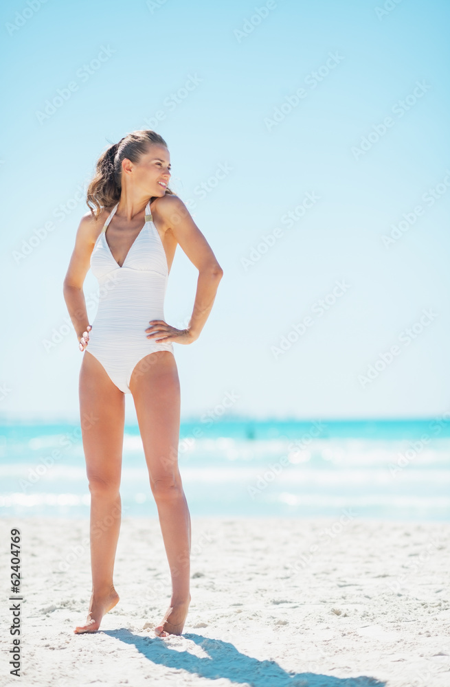 Full length portrait of young woman looking on copy space Full length portrait of young woman looking on copy space
