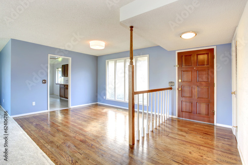 View of the emplty entrance hallway and living room