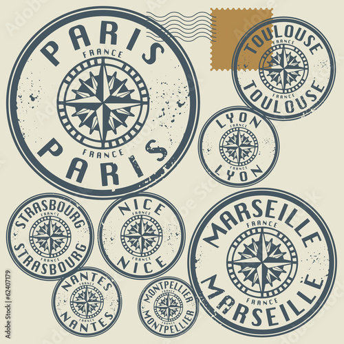 Grunge rubber stamp set with names of France cities