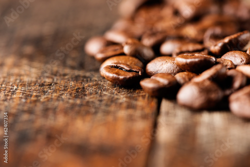 Coffee on grunge wooden background macro horizontal