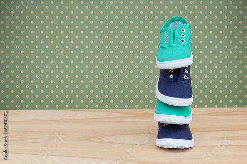 A pile of children's shoes background.