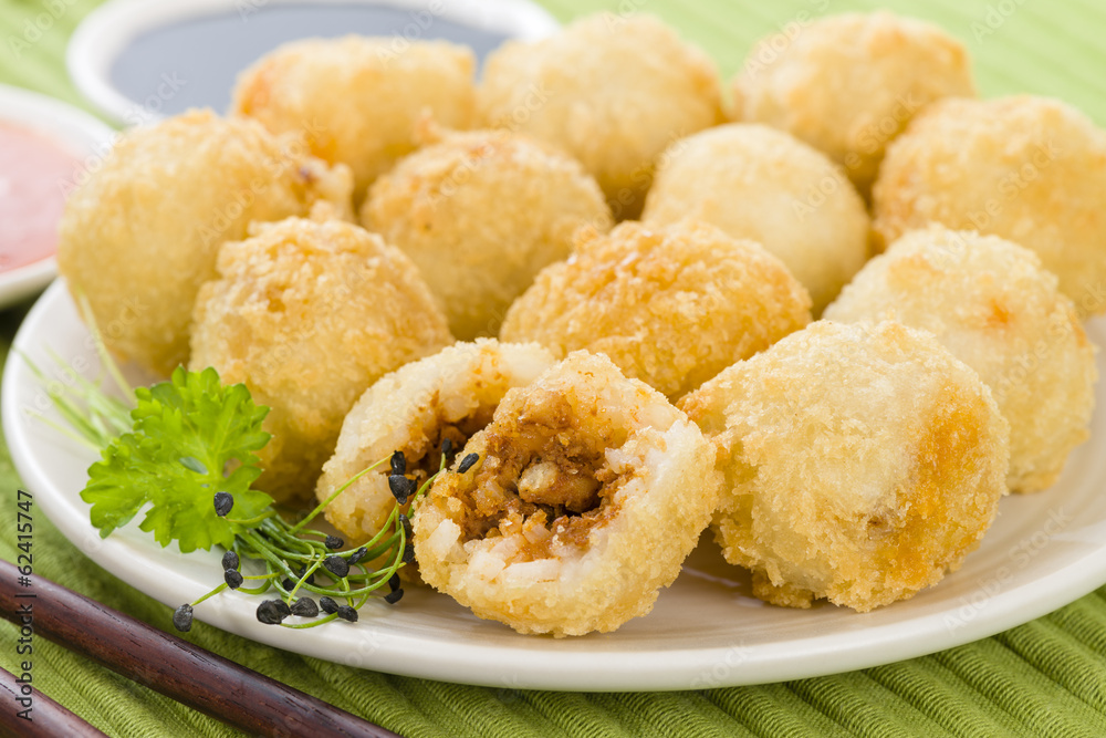 Katsu Balls Japanese breaded and fried rice balls with curry Stock
