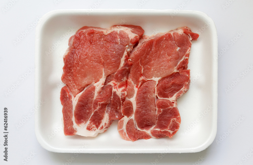 Schweinekoteletts, roh in Styroporschale Schweinekoteletts, roh in Styroporschale