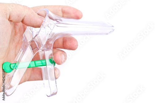 Hand holding a speculum