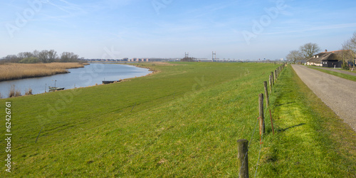 Skyline of an ancient city along a river photo