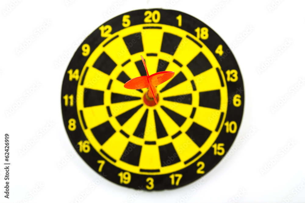 Red dart hitting in the target center