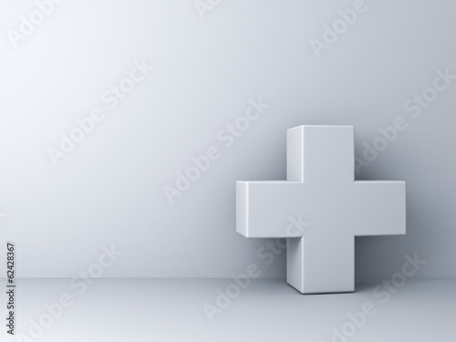 White plus sign abstract concept on white wall background